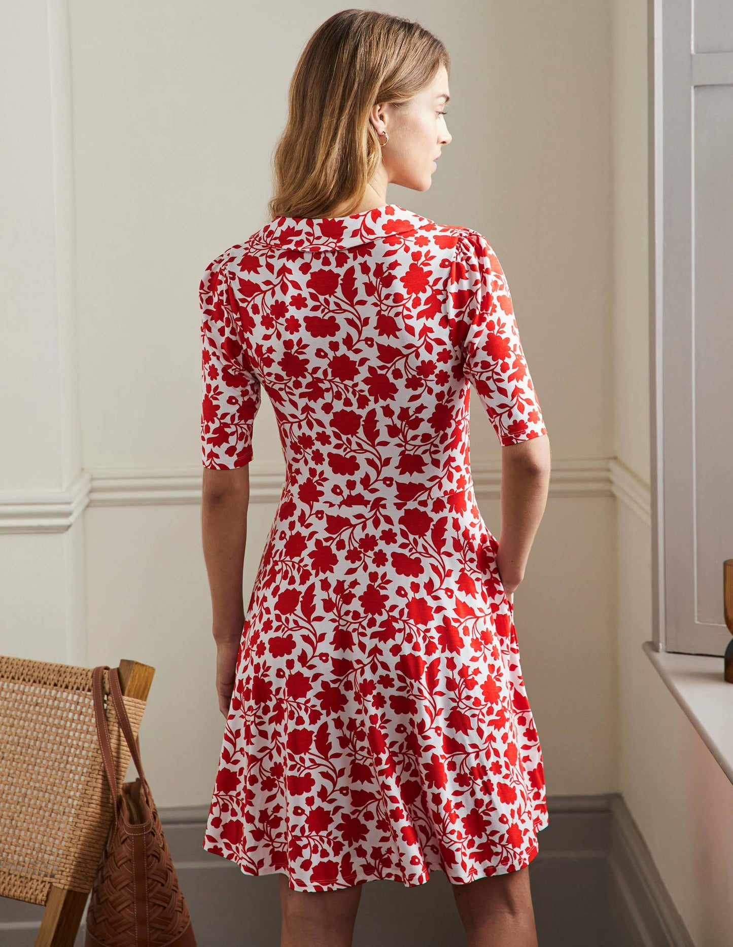 Jerseykleid mit fixierter Wickeloptik-Papayaorange, Botanische Silhouette