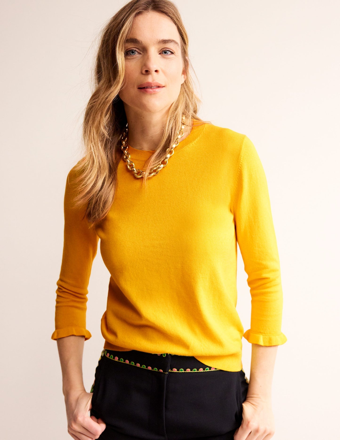 Rüschen-Pullover aus Baumwolle und Merinowolle-Mimosengelb