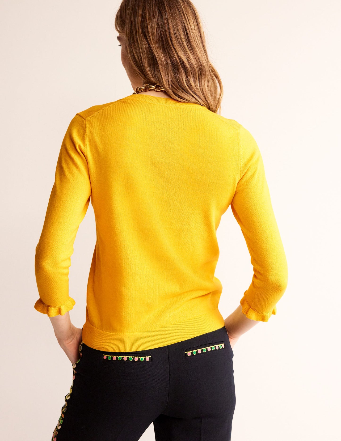 Rüschen-Pullover aus Baumwolle und Merinowolle-Mimosengelb