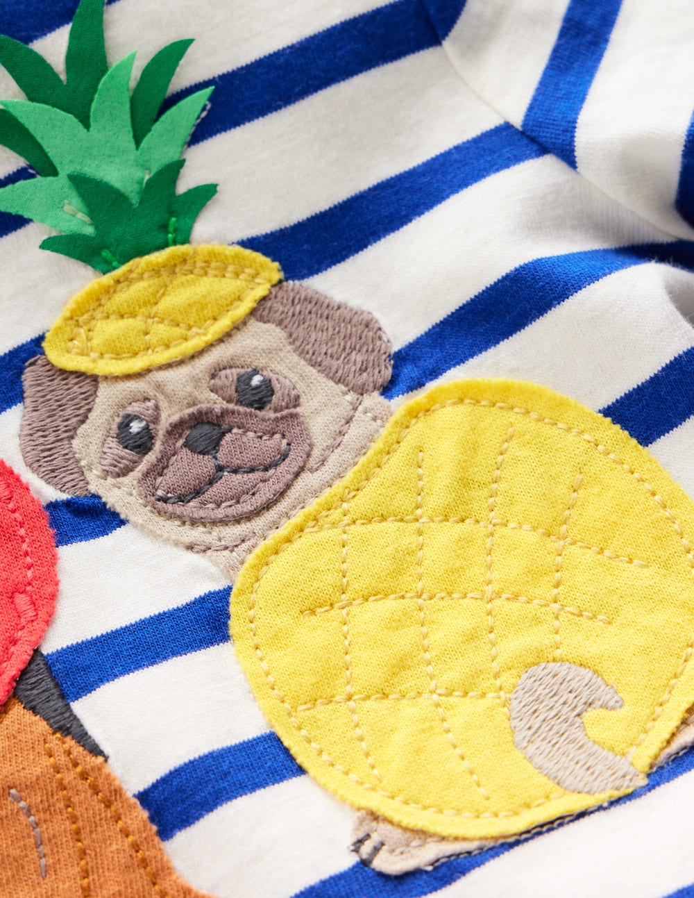 T-Shirt mit Applikation-Leuchtendes Blau Streifen Obst Hunde