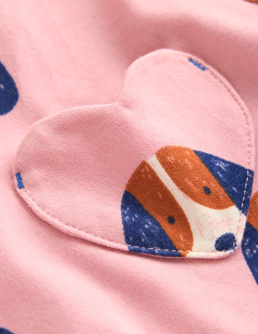 Robe en jersey fun avec poche en cœur-Chiots espacés rose vintage