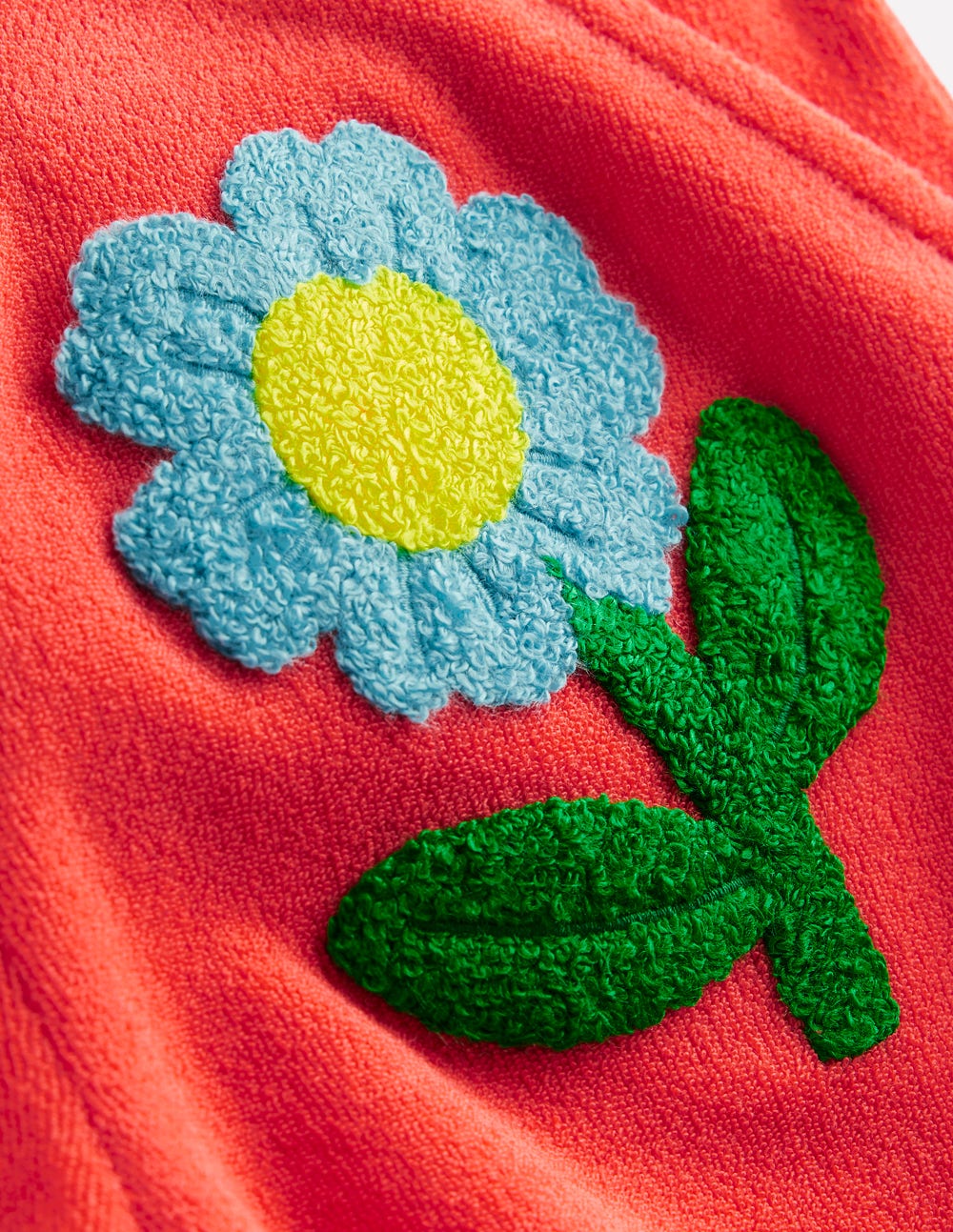 Gemusterte Frottee-Shorts-Korallenorange Blumen
