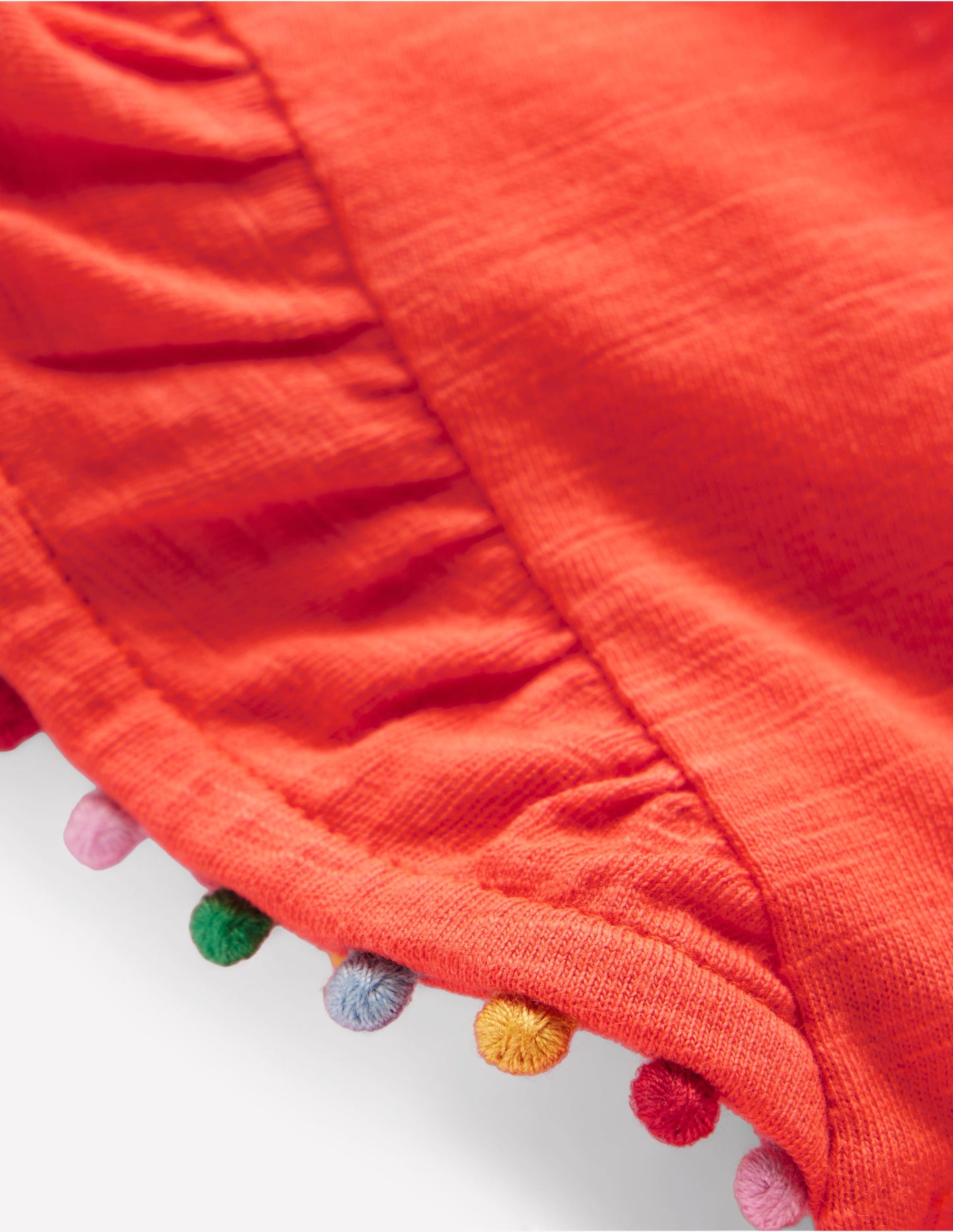 Oberteil mit Rüschenärmeln und Bommeln-Korallenorange