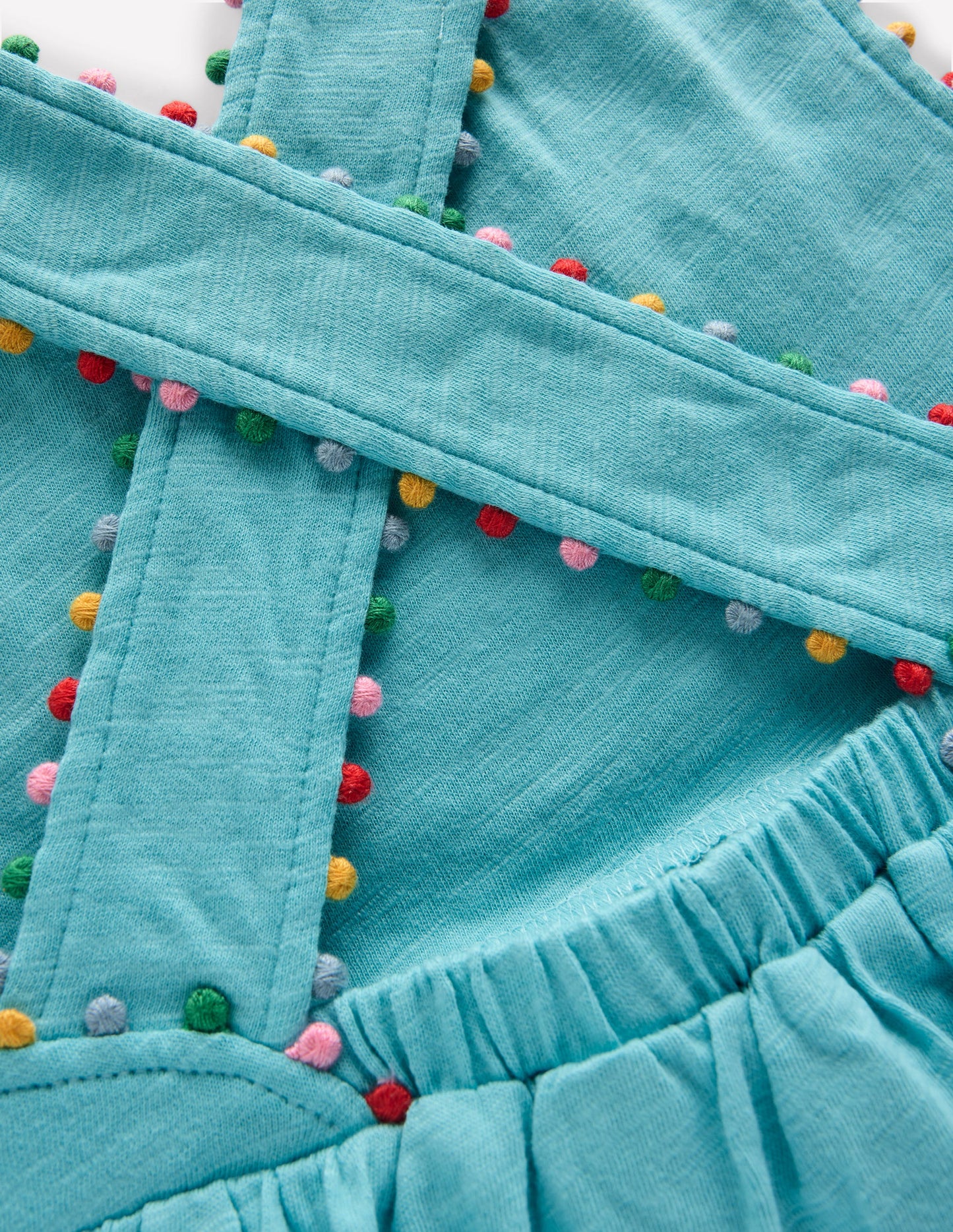 Top mit gekreuzten Rückenträgern und Bommeln-Karibikblau