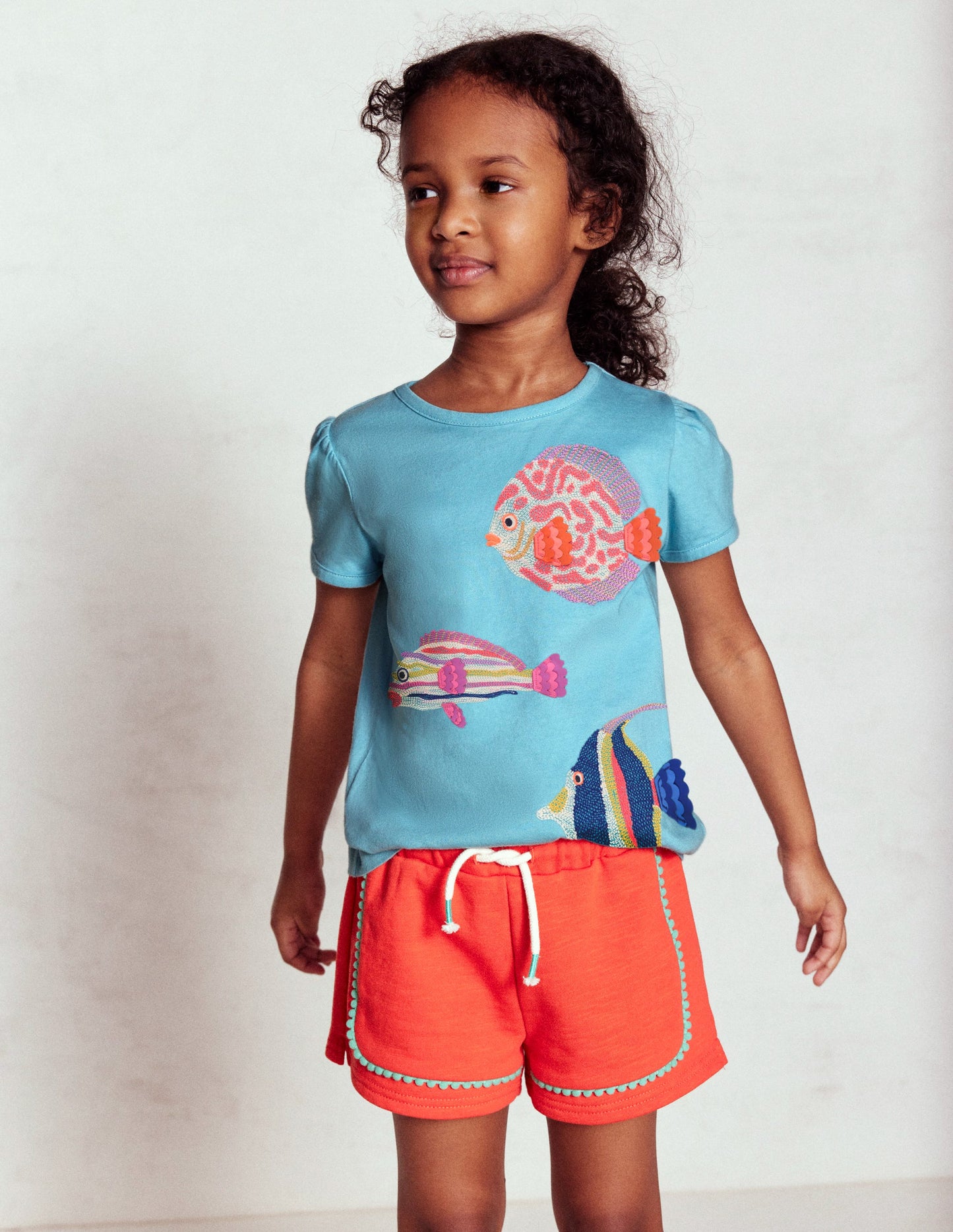 Top à manches bouffantes et super surpiqûres-Poisson bleu mer