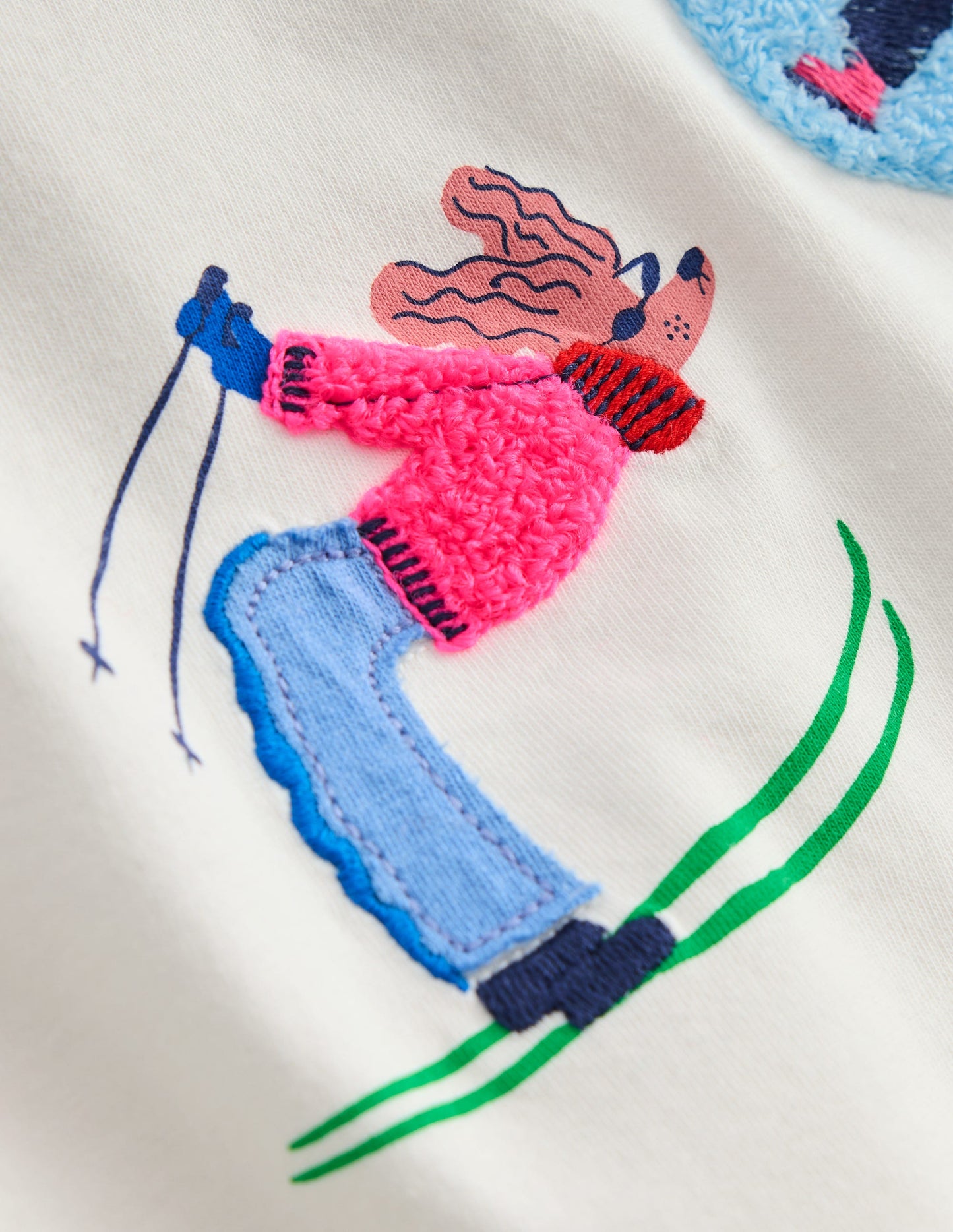 Langarmshirt aus Bouclé-Sanftes Naturweiß Skifahrer