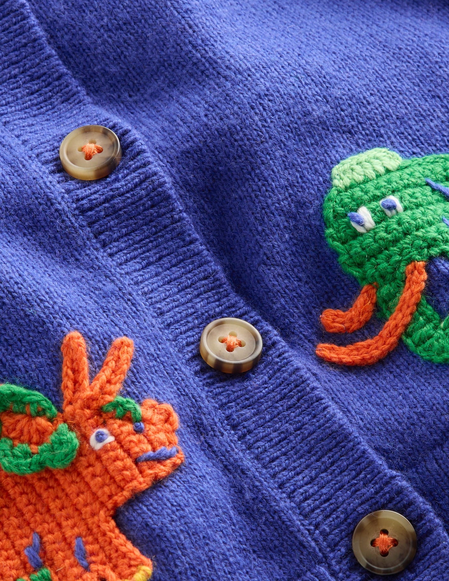 Originelle Logo-Strickjacke-Saphirblau Prähistorisch Logo