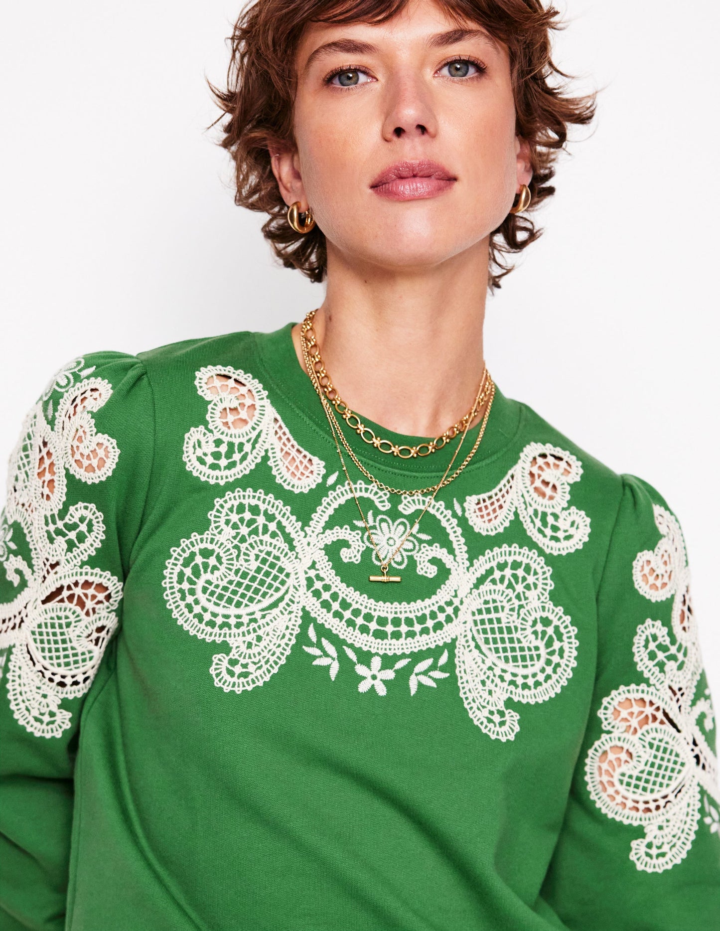 Sweatshirt mit Puffärmeln und Cutwork-Design-Paradiesgrün