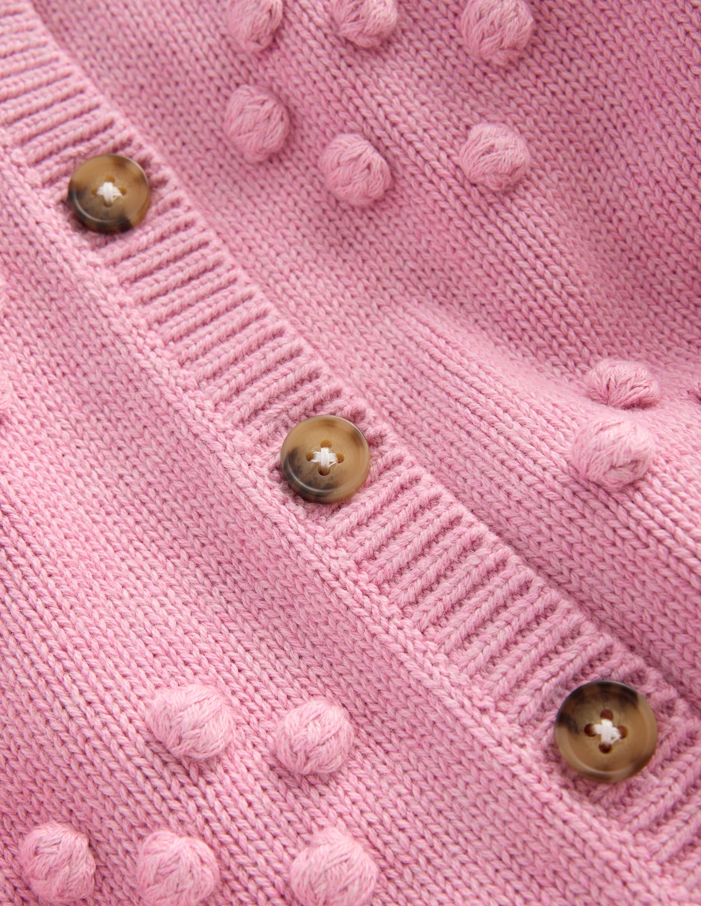 Hübsche Strickjacke mit Bommeln-Kirschblütenrosa