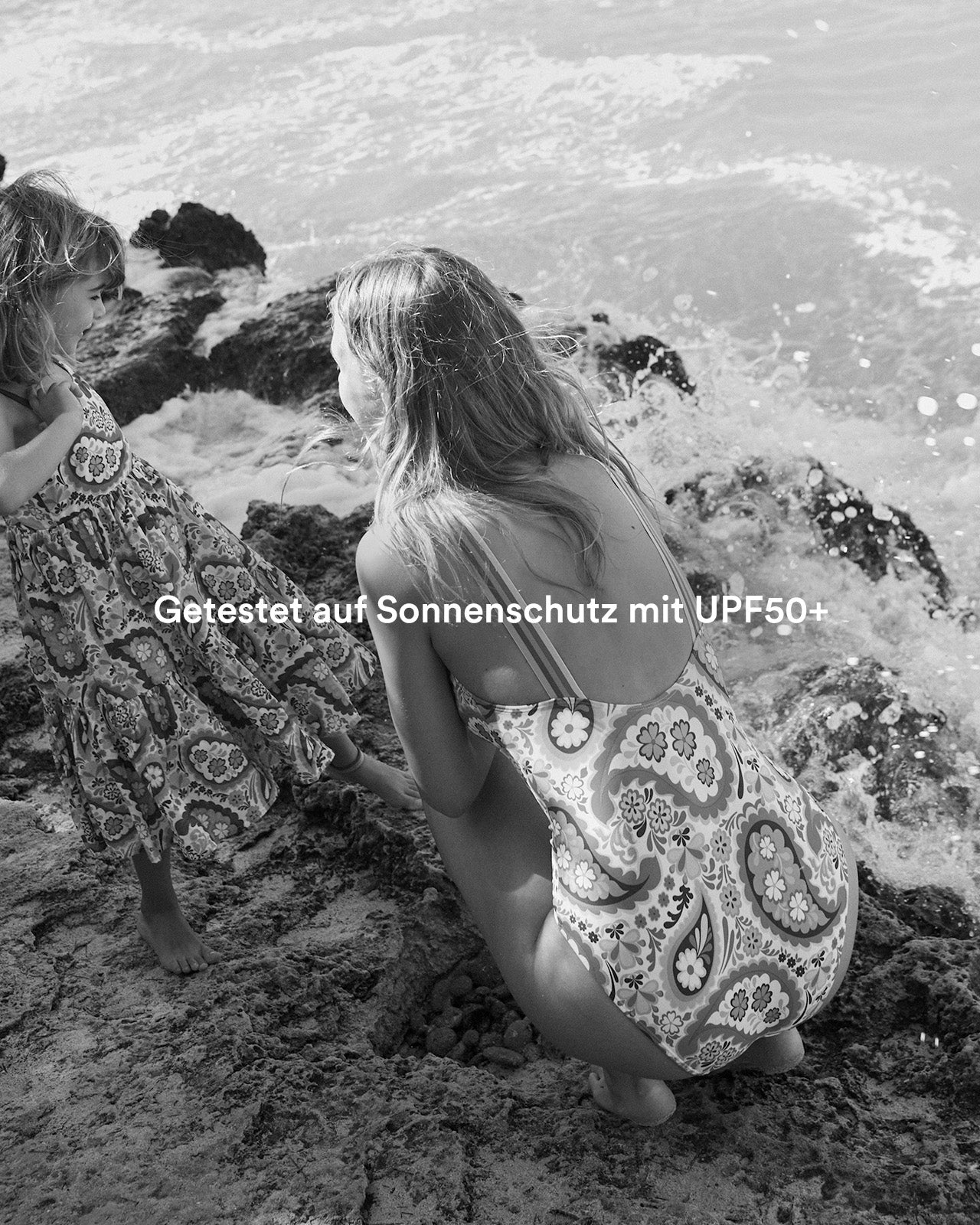 Woman and girl in Boden printed beachwear