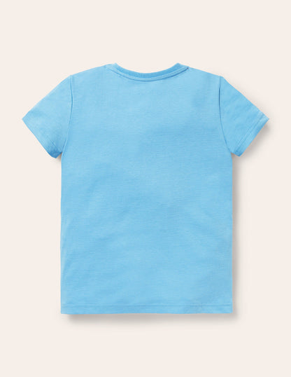 Oberteil mit Szenenmotiv-Surfbrett-Blau, Stadion