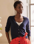 Cardigan festonné en laine mérinos-Bleu marine