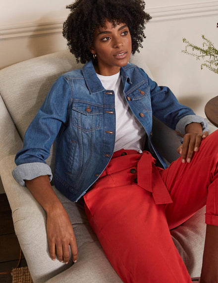 Authentische Denim-Jacke-Mittleres Vintageblau