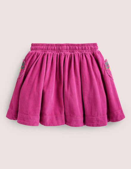 Ausgestellter Webrock mit Stickerei-Knallpink, Stickerei
