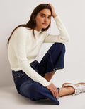 Gerippter Pullover mit hohem Kragen-Naturweiß