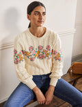 Bestickter Pullover mit Zopfstrickmuster-Naturweiß, Blumenstickerei