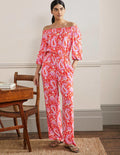 Schulterfreier Jumpsuit-Papayaorange, Bezauberndes Paisleymuster