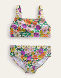 Bikini mit Gänseblümchenträgern-Naturweiß/Strahlendes Orchideenviolett, Blumenmuster