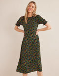 Robe midi style 40s Corinne-Noir, motif Petal Foliage