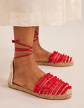 Flache Espadrilles mit Fransen-Zinnoberrot