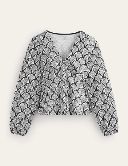 Oberteil mit V-Ausschnitt und Schößchen-Schwarz, Blumig-9