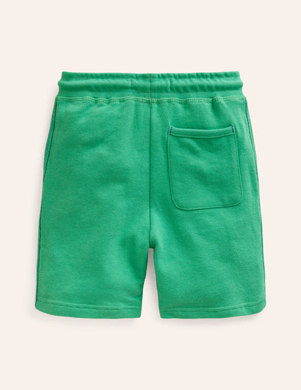 Short de survêtement essentiel-Erbsengrün