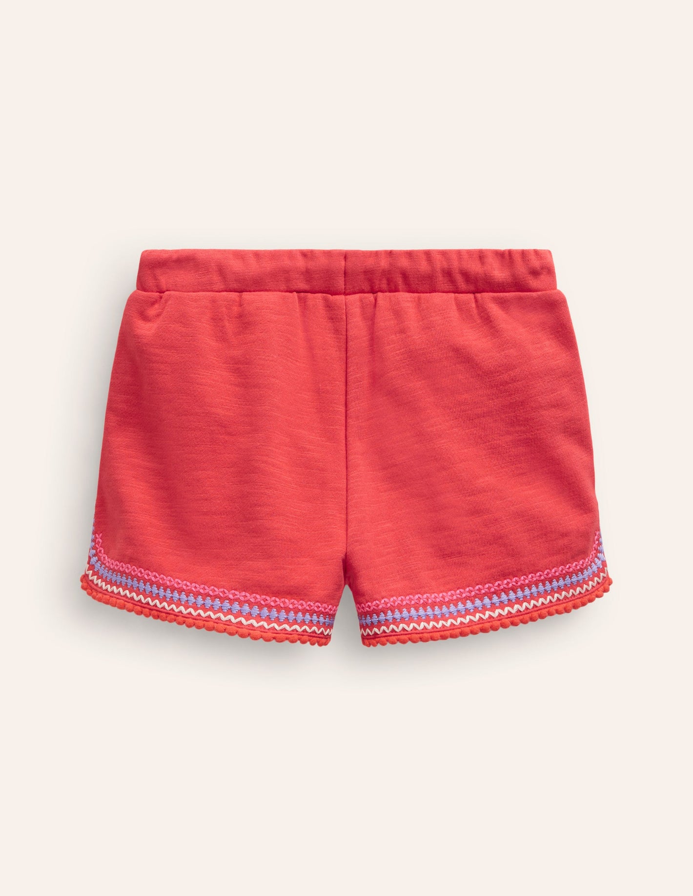 Jersey-Shorts mit Bommelbesatz-Marmeladenrot