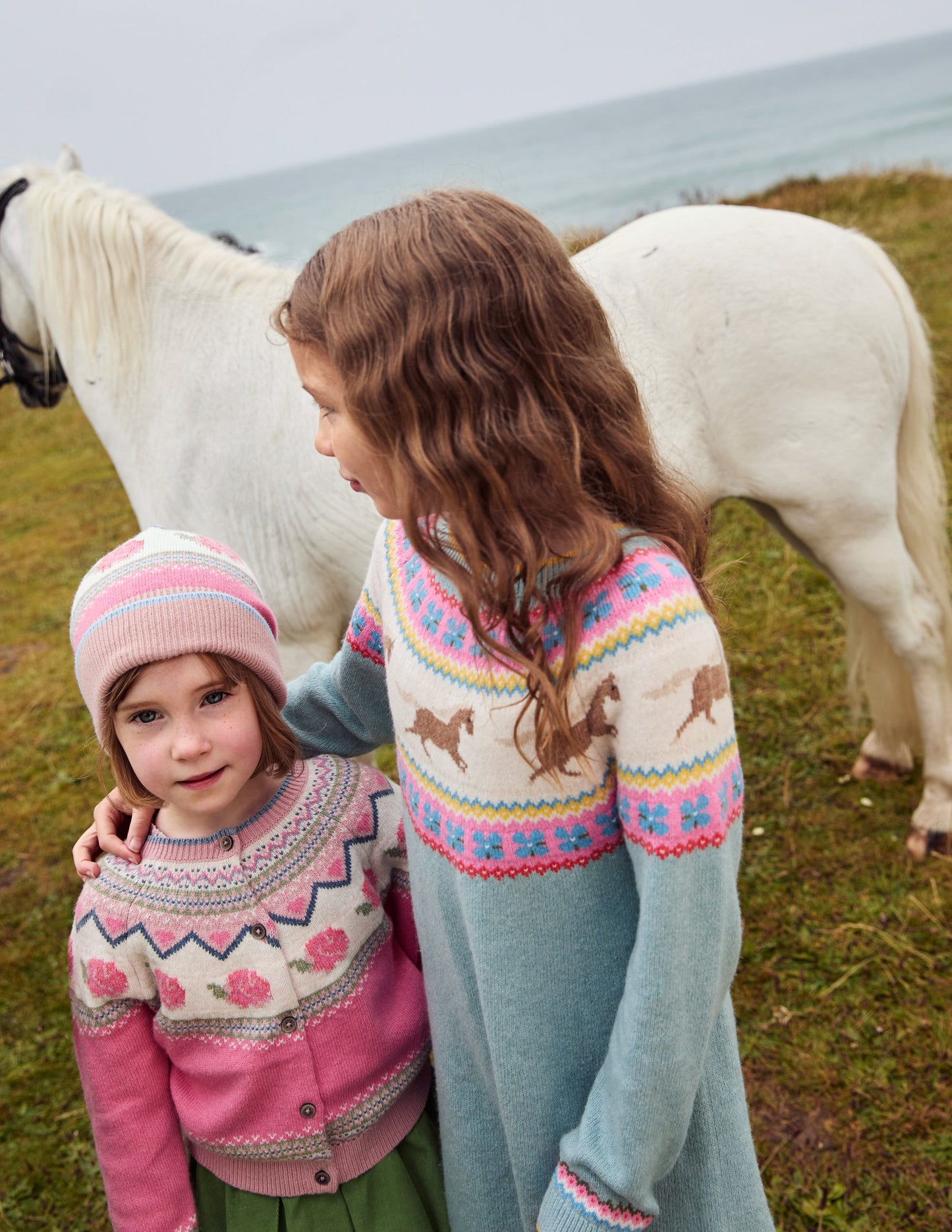 Fair-Isle-Strickset-Rosenblütenrosa Blumen