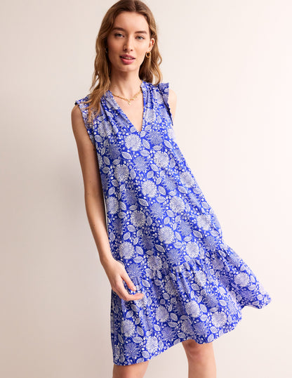 Robe courte Daisy volantée en jersey-Bleu connecté, motif Gardenia Swirl-1