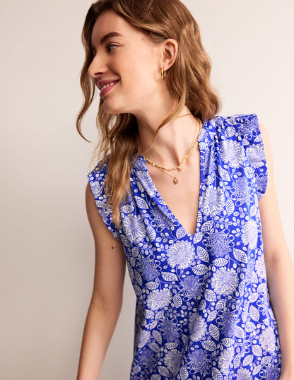 Robe courte Daisy volantée en jersey-Bleu connecté, motif Gardenia Swirl-2