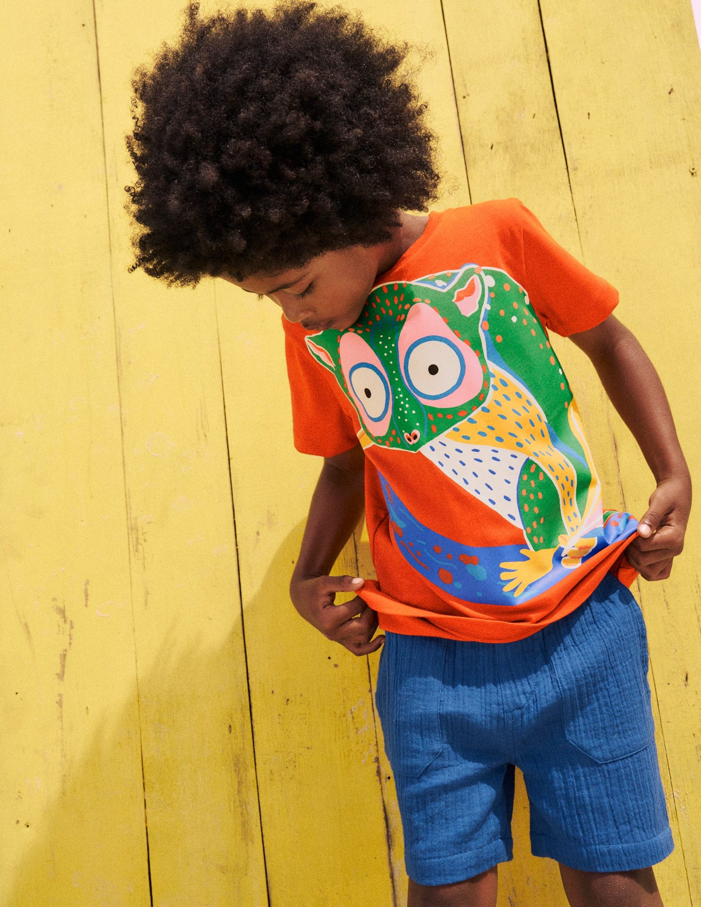 Im Dunkeln leuchtendes T-Shirt-Tonorange Dschungelbaby