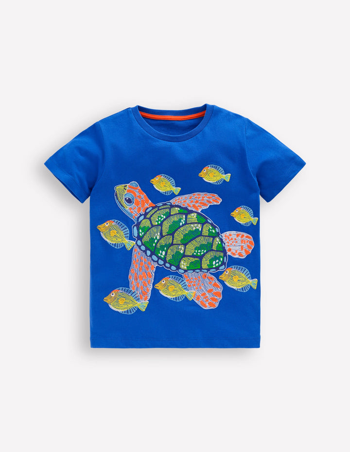 Im Dunkeln leuchtendes T-Shirt mit Superstitch-Galerieblau Schildkröte