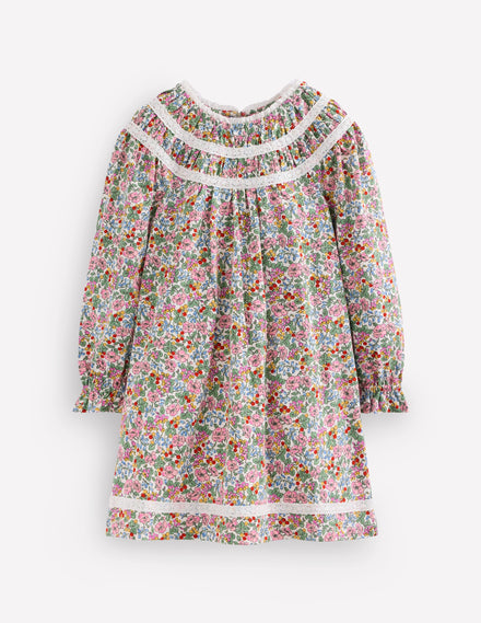 Jolie robe en jersey à détails en dentelle-Motif floral baies ivoire doux