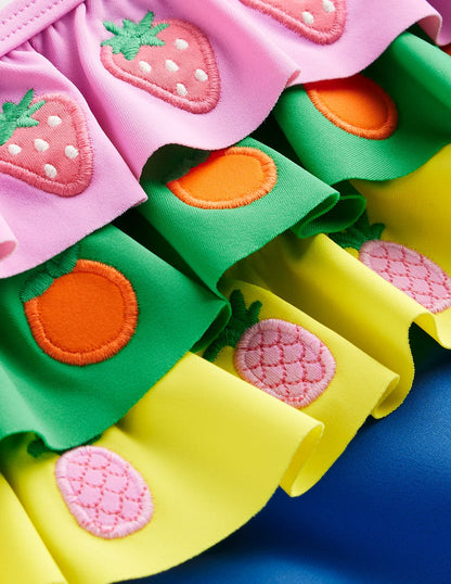 Lila Badeanzug mit einem Träger-Bunt, Früchte