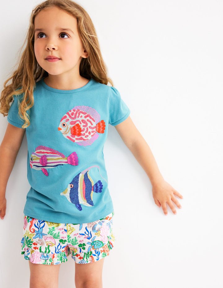 Top à manches bouffantes et super surpiqûres-Poisson bleu mer