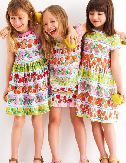 Robe en jersey fun avec poche en cœur-Rayé fruits arc-en-ciel