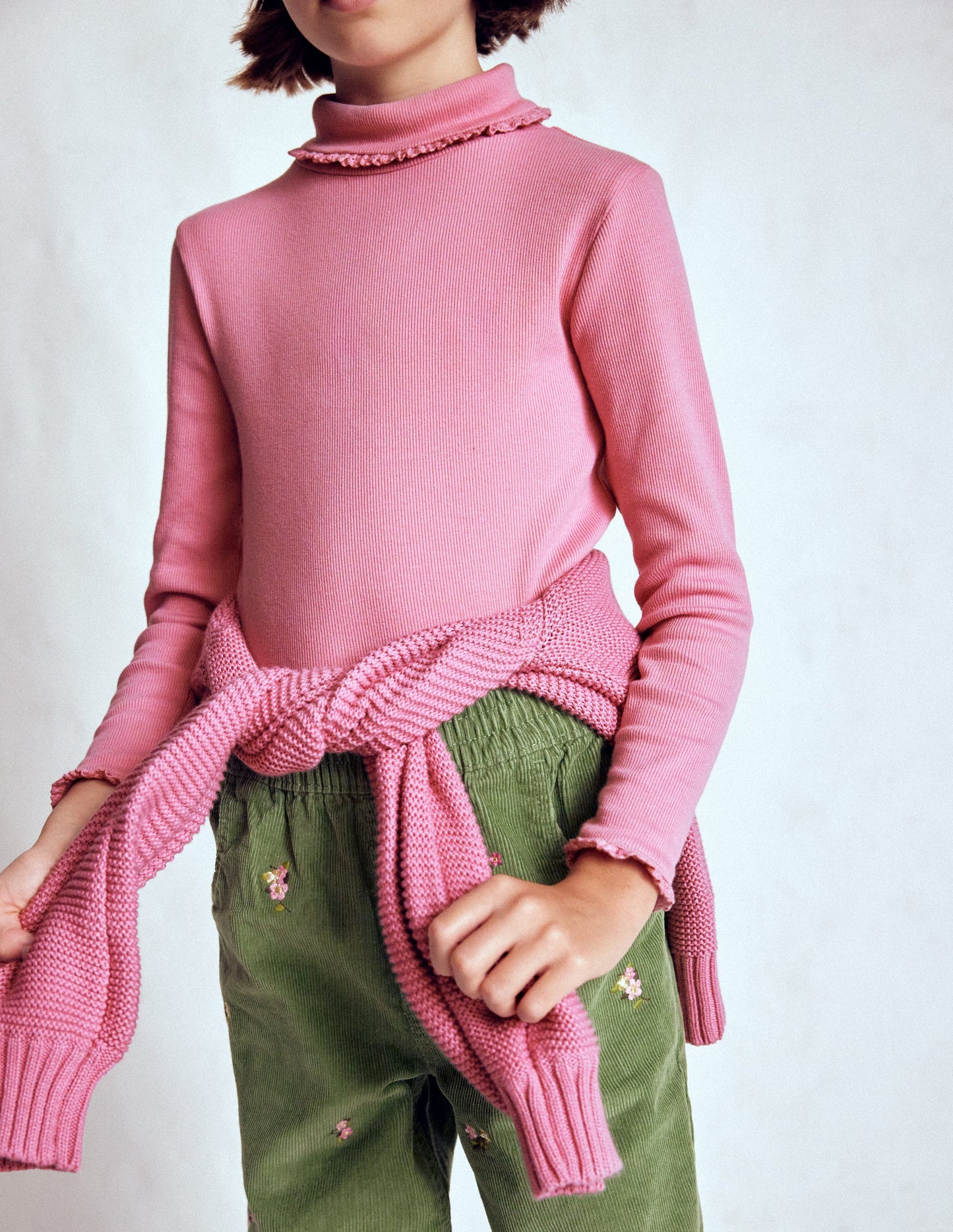 Geripptes Rollkragenoberteil-Rosa Schleier