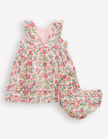 Schürzenkleid mit Rüschen-Kreiderosa Garten-Blümchen