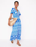 Ellie Wallendes Maxi-Teekleid-Himmelblau, Tropische Ornamente