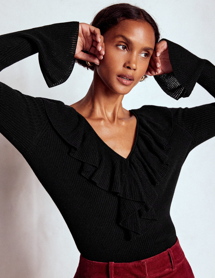Pull côtelé à col tunisien et volants-Noir