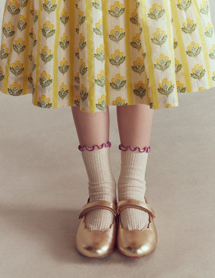 Mary Janes mit Muschelsaum-Gold