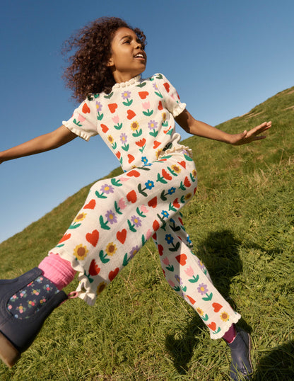 Gestricktes Oberteil mit Rüschen-Beige meliert Sonnenblumengarten-1