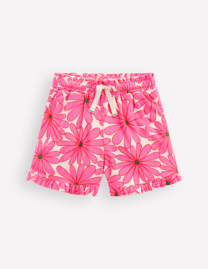 Frottee-Shorts mit Rüschen-Festivalrosa Riesengänseblümchen