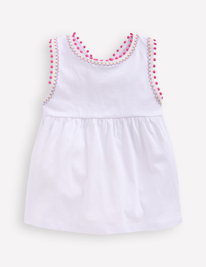 Oberteil mit überkreuzten Rückenträgern und Bommelbesatz-Weiß