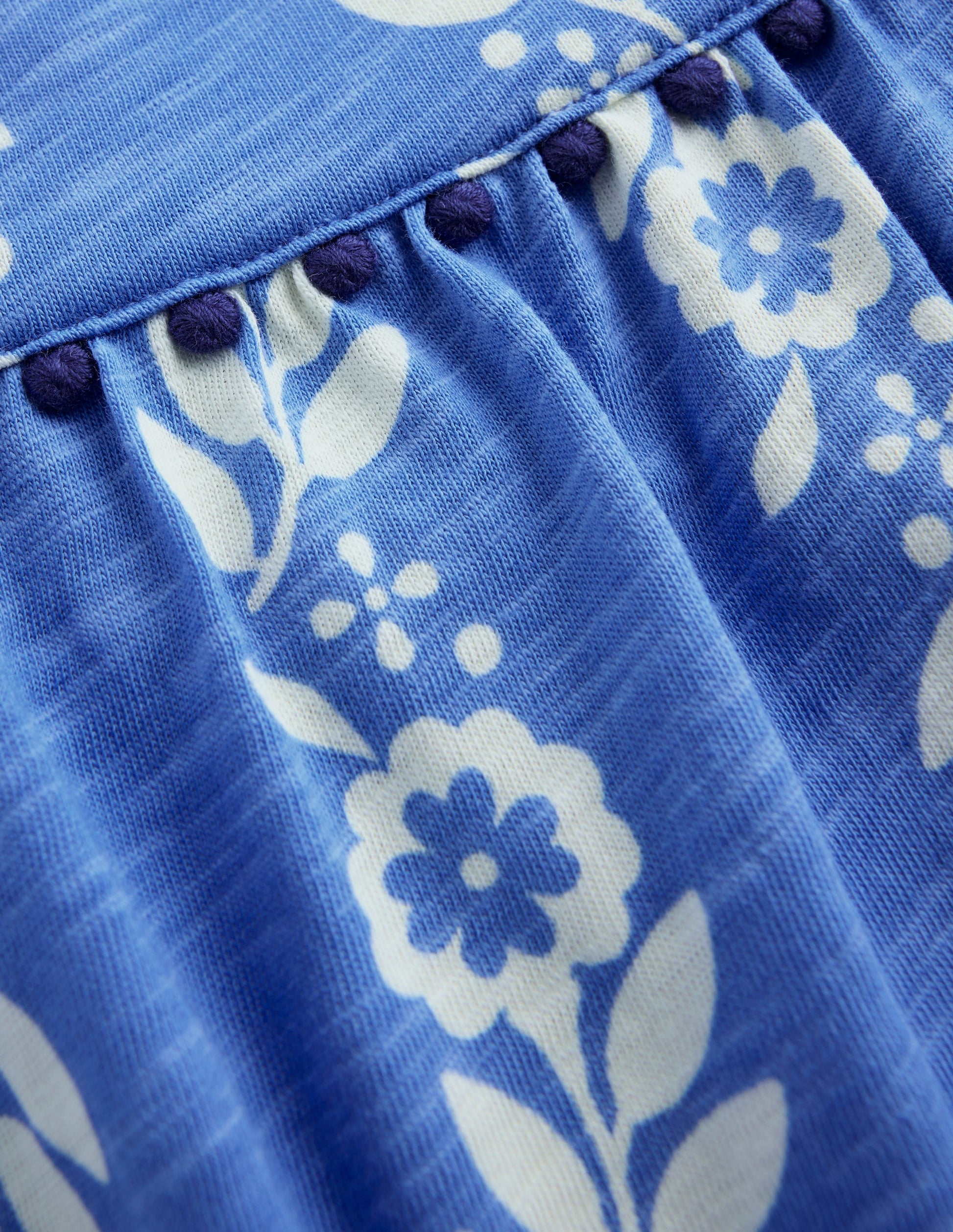 Ciara Jersey-Spielanzug mit Bommelbesatz-Blau Geblümt-5