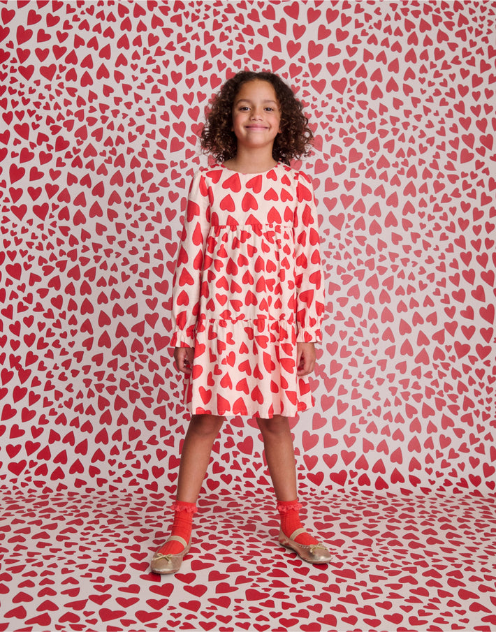 Girl wearing love heart dress
