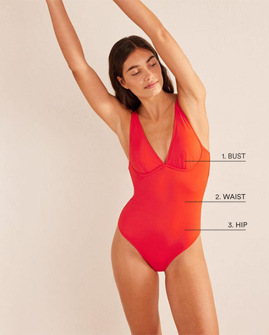 Boden female model image with text pointing to the bust, waist & hip of her outfit